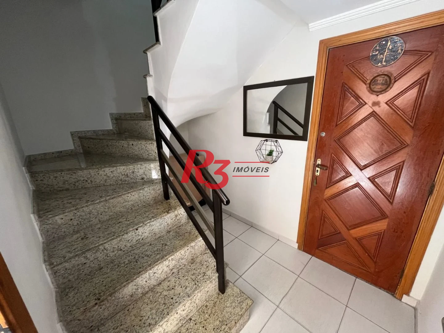 Casa com 3 dormitórios à venda, 141 m² por R$ 690.000,00 - Centro - São Vicente/SP