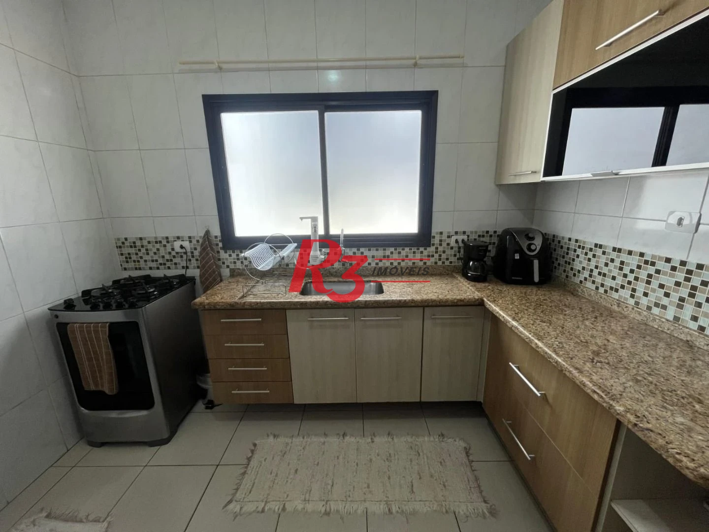 Casa com 3 dormitórios à venda, 141 m² por R$ 690.000,00 - Centro - São Vicente/SP