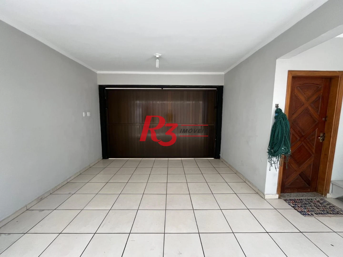 Casa com 3 dormitórios à venda, 141 m² por R$ 690.000,00 - Centro - São Vicente/SP