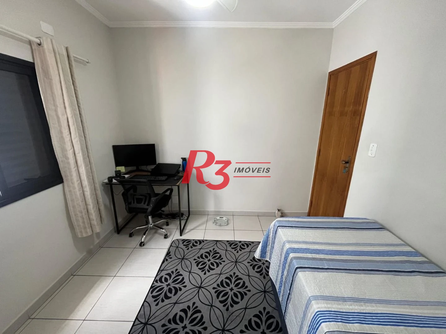 Casa com 3 dormitórios à venda, 141 m² por R$ 690.000,00 - Centro - São Vicente/SP