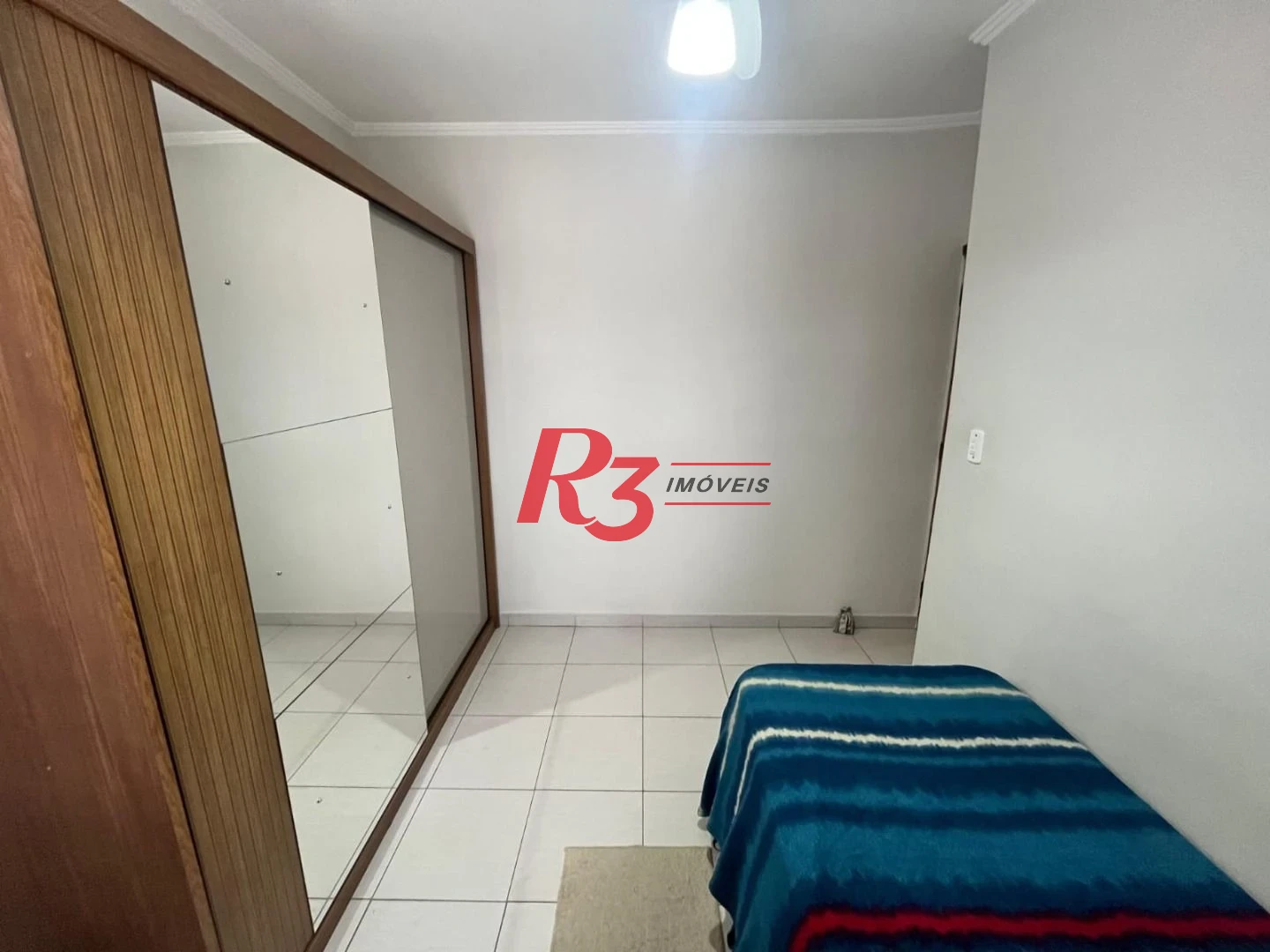 Casa com 3 dormitórios à venda, 141 m² por R$ 690.000,00 - Centro - São Vicente/SP