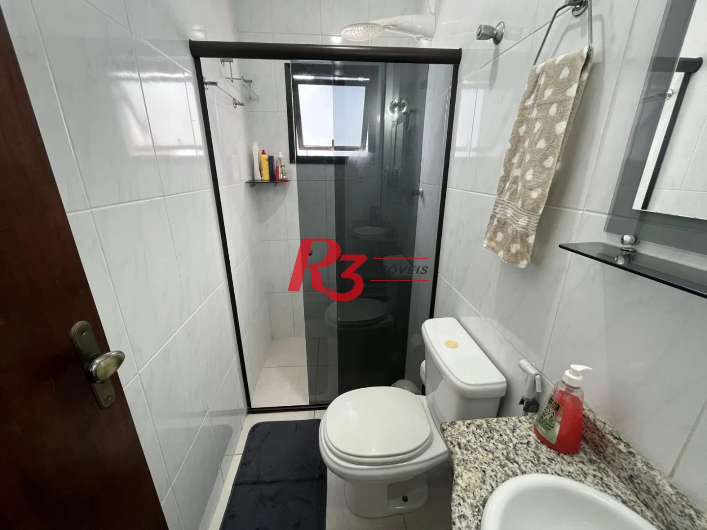 Casa com 3 dormitórios à venda, 141 m² por R$ 690.000,00 - Centro - São Vicente/SP