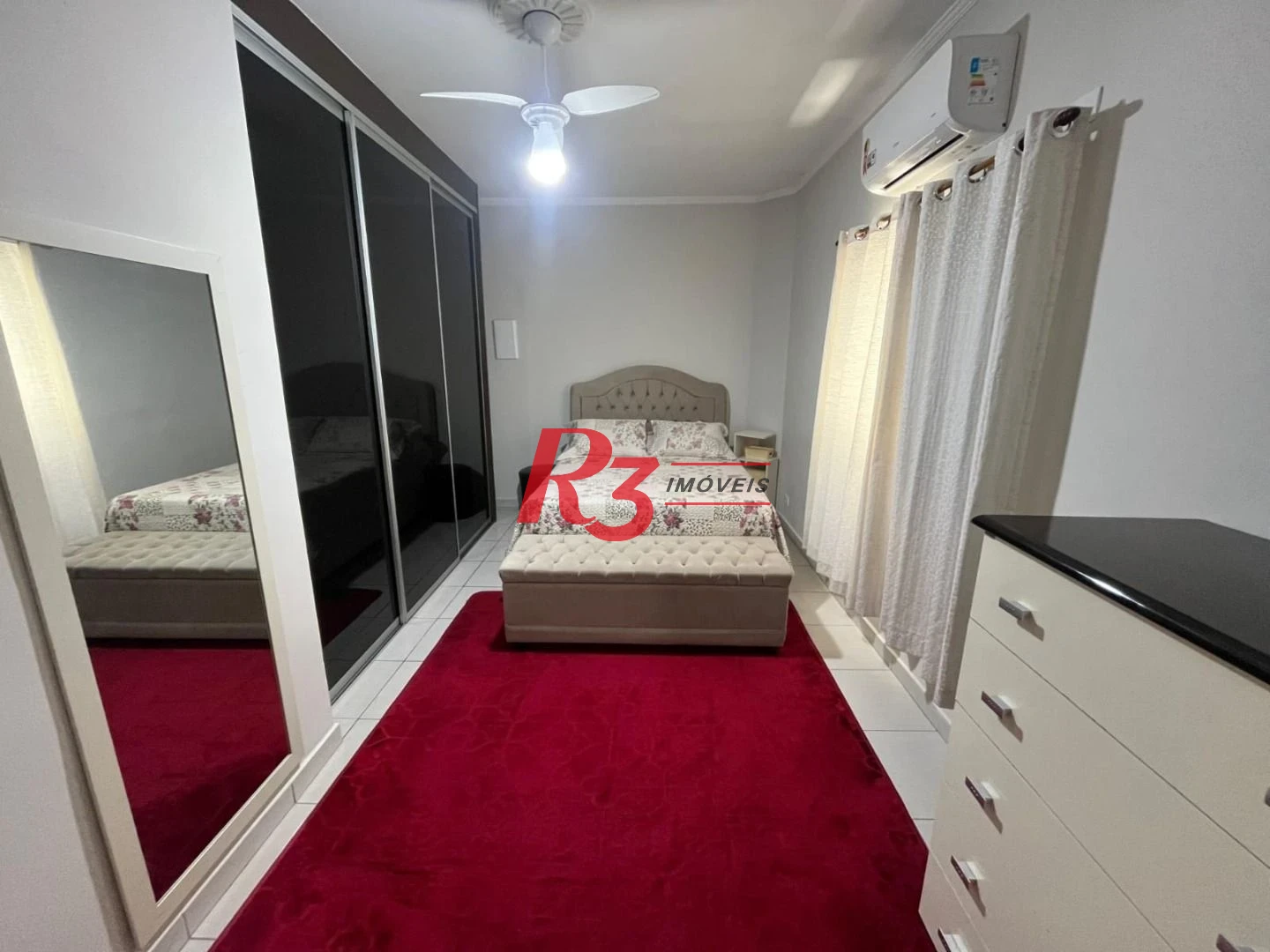 Casa com 3 dormitórios à venda, 141 m² por R$ 690.000,00 - Centro - São Vicente/SP
