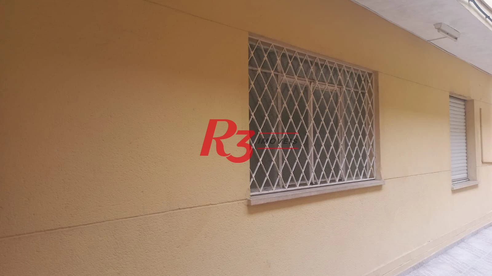 Apartamento com 2 dormitórios à venda, 74 m² por R$ 360.000,00 - Gonzaga - Santos/SP