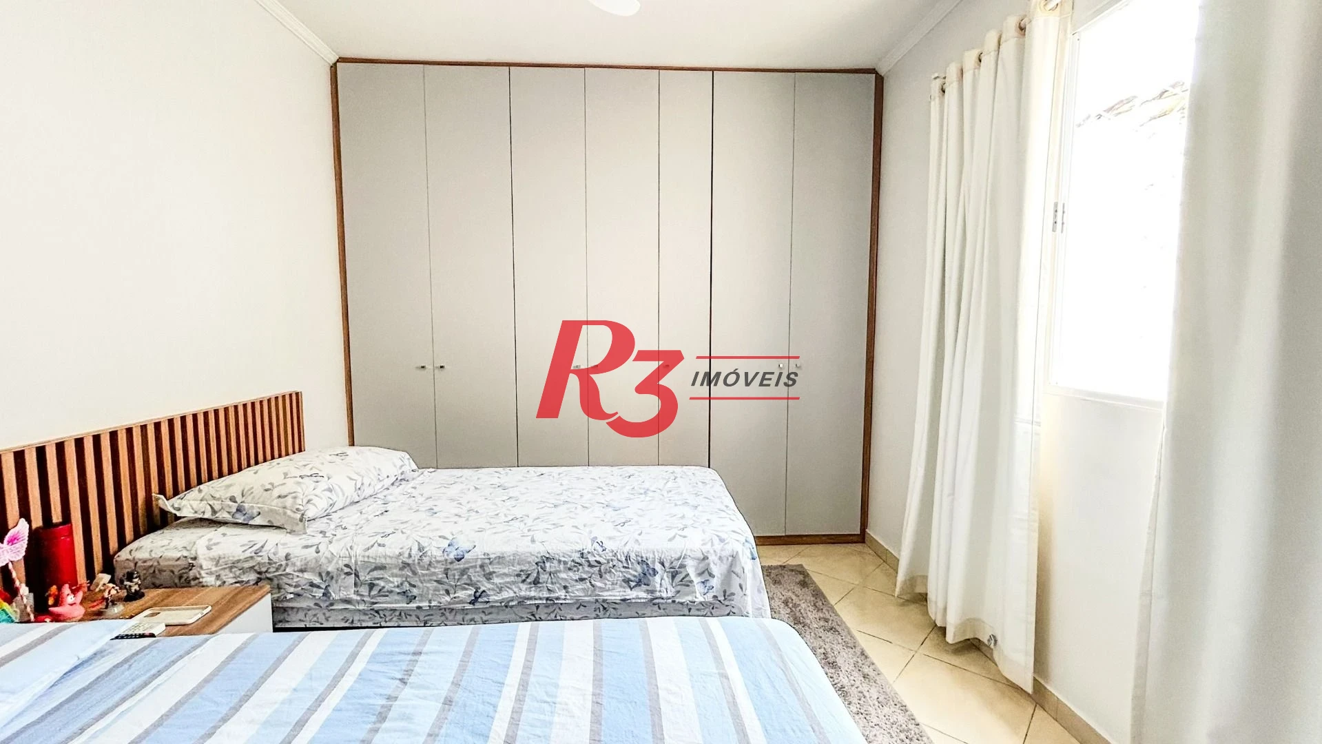Casa com 3 dormitórios à venda, 125 m² por R$ 1.280.000,00 - Ponta da Praia - Santos/SP