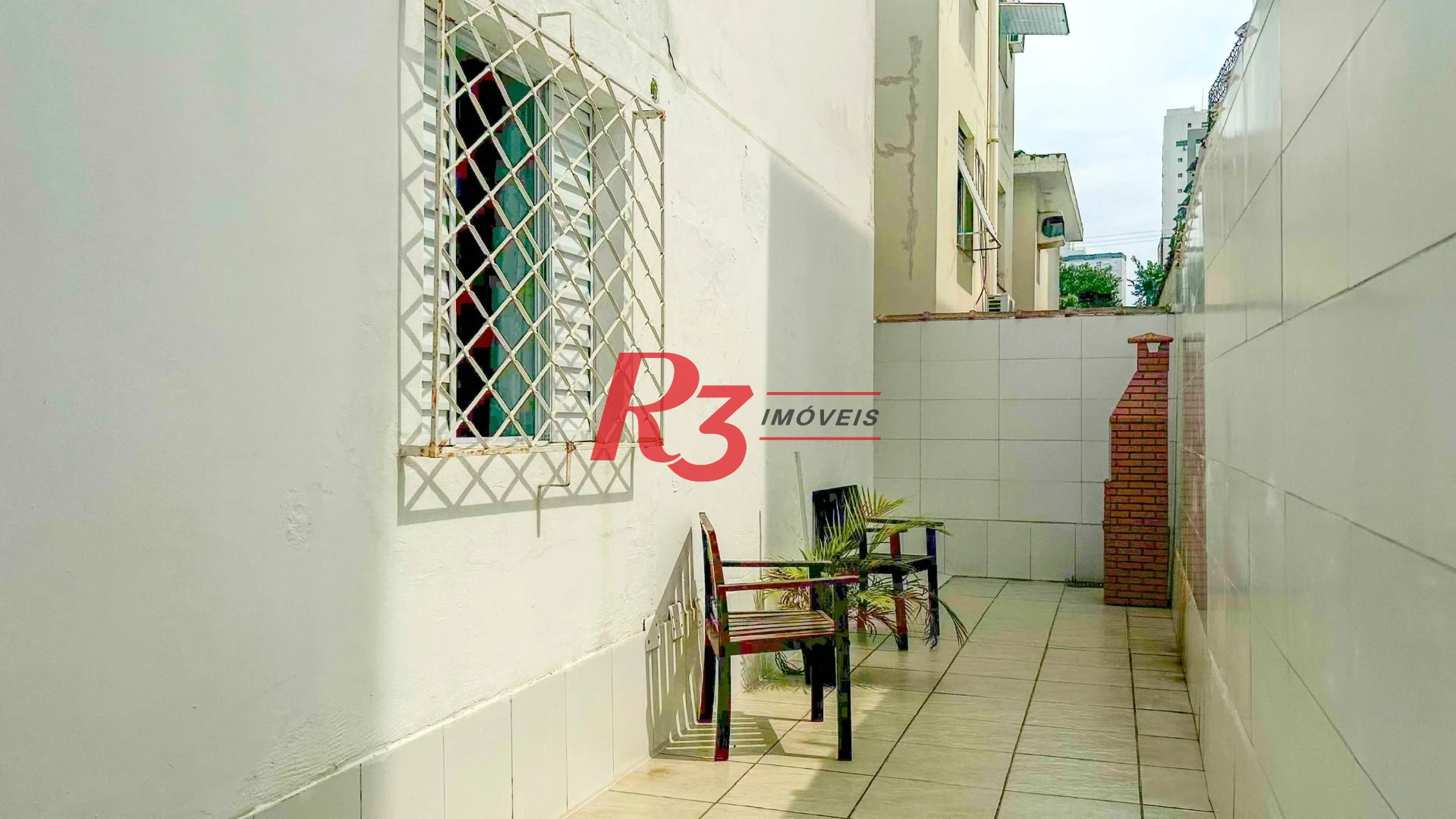 Casa com 3 dormitórios à venda, 125 m² por R$ 1.280.000,00 - Ponta da Praia - Santos/SP