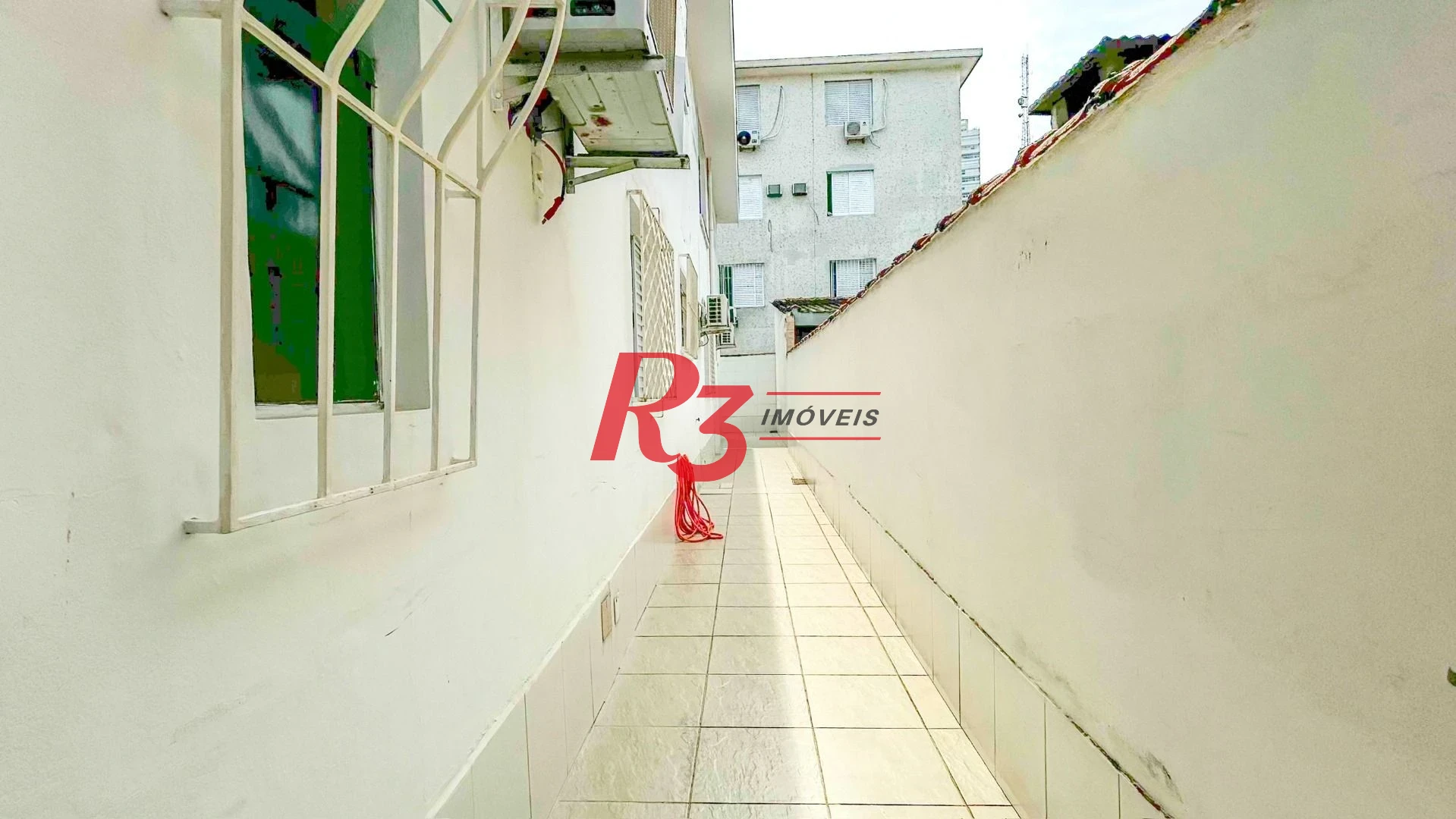 Casa com 3 dormitórios à venda, 125 m² por R$ 1.280.000,00 - Ponta da Praia - Santos/SP