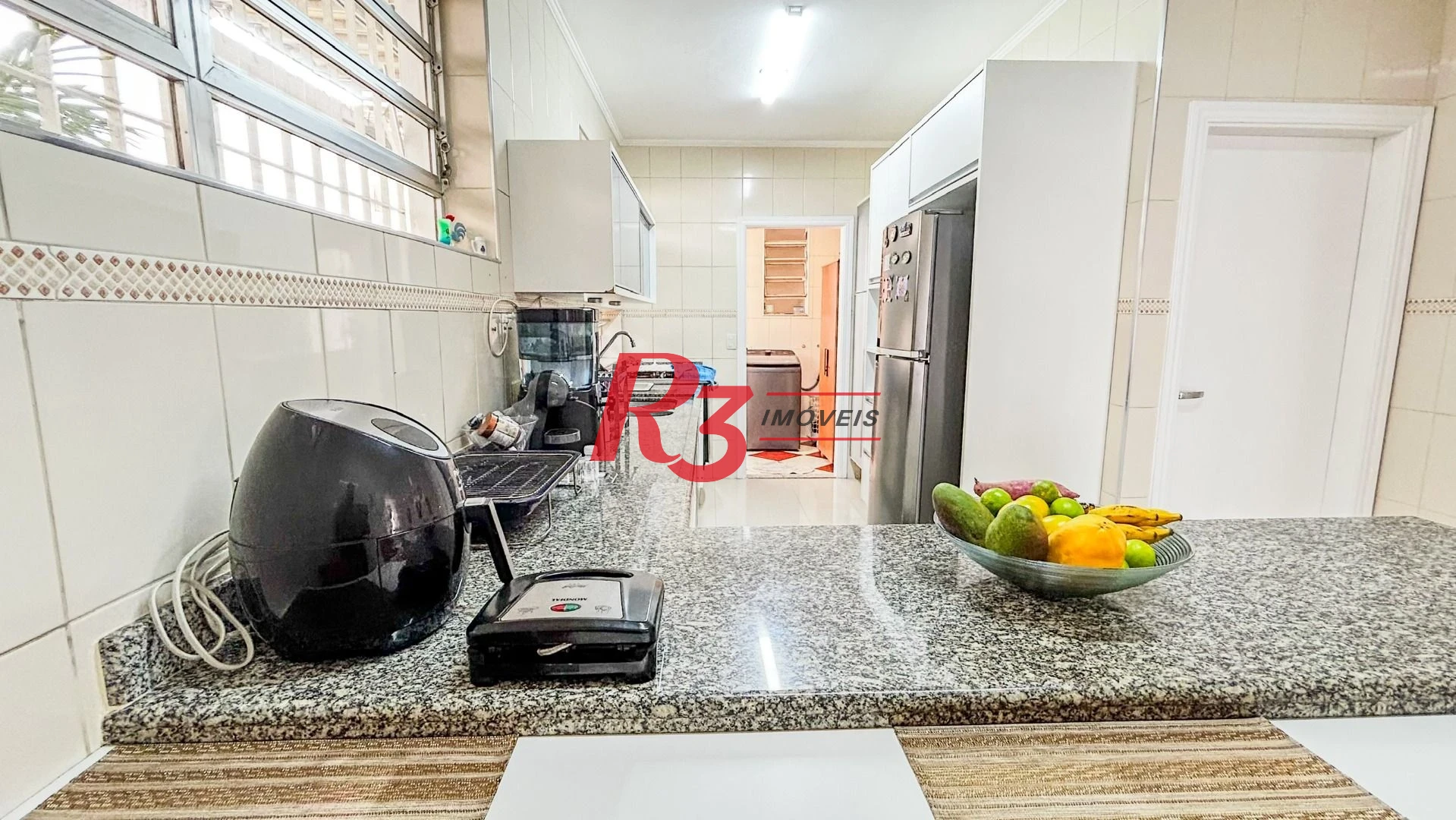Casa com 3 dormitórios à venda, 125 m² por R$ 1.280.000,00 - Ponta da Praia - Santos/SP