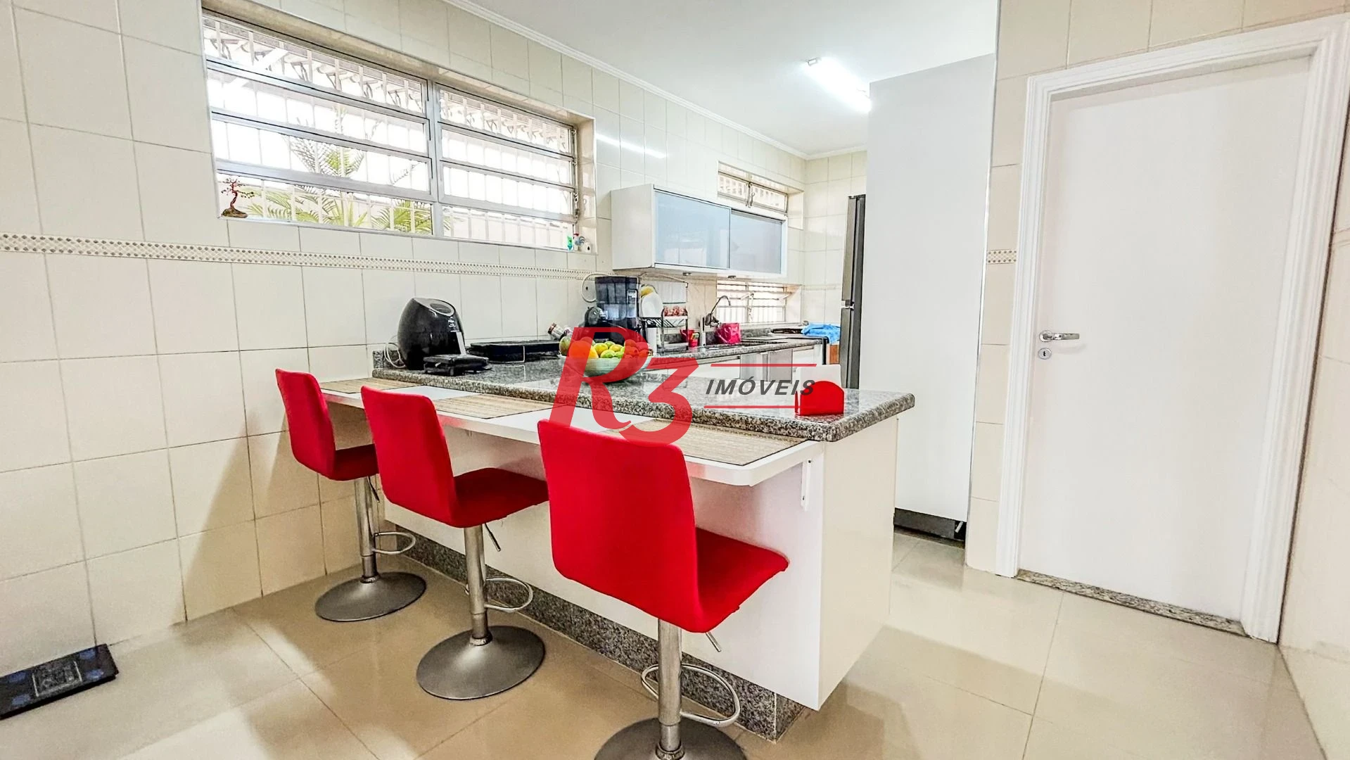 Casa com 3 dormitórios à venda, 125 m² por R$ 1.280.000,00 - Ponta da Praia - Santos/SP