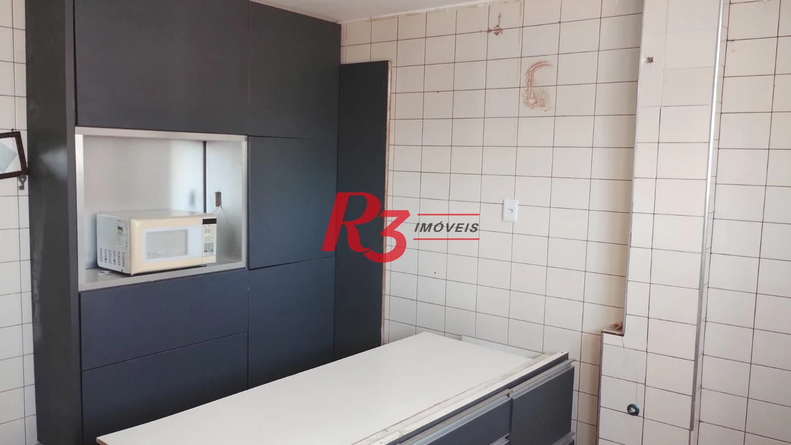 Apartamento com 3 dormitórios à venda, 125 m² por R$ 410.000,00 - Centro - São Vicente/SP
