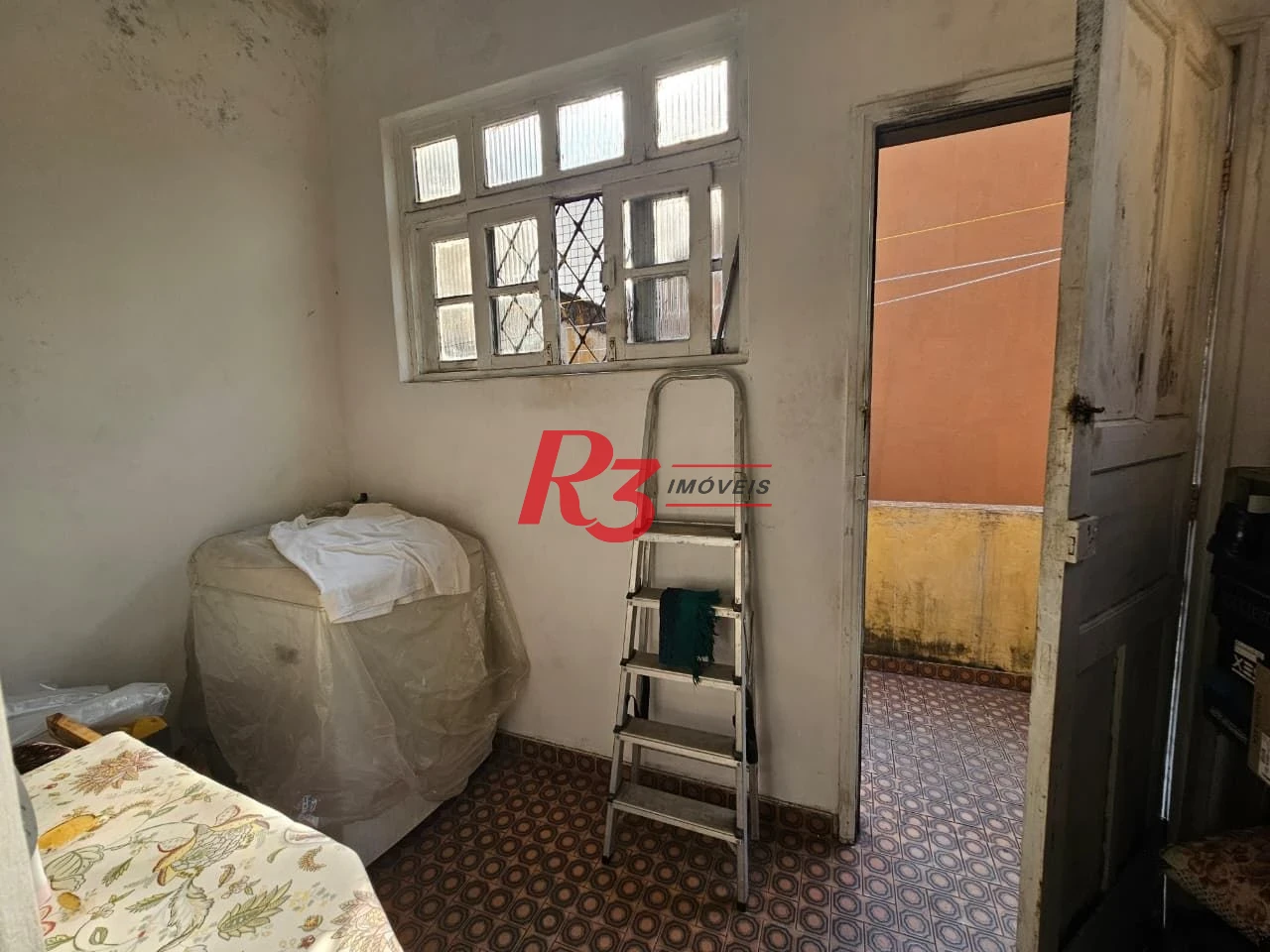 Sobrado com 3 dormitórios à venda, 150 m² por R$ 1.300.000,00 - Pompéia - Santos/SP