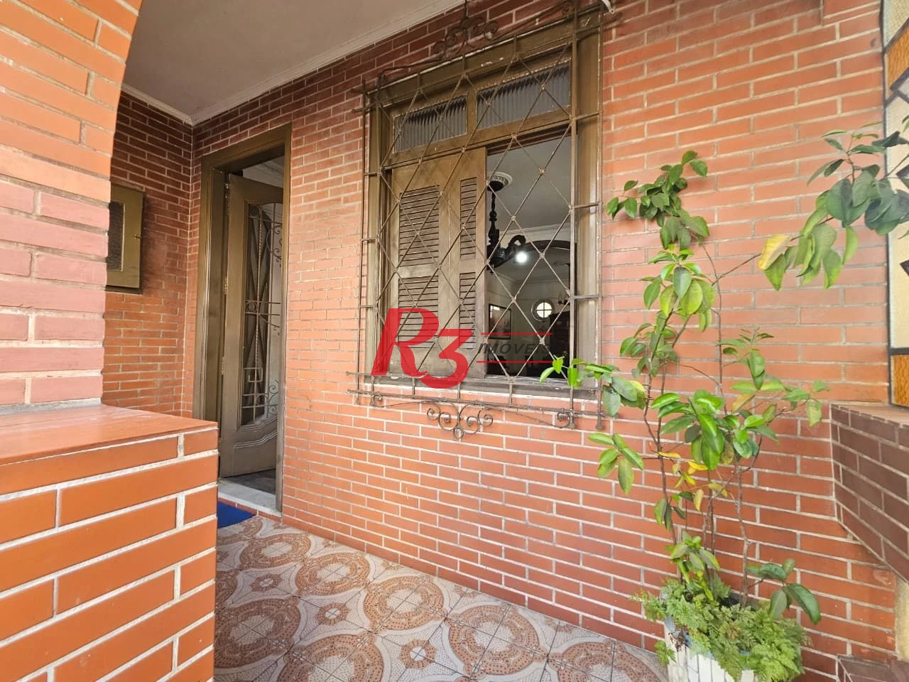 Sobrado com 3 dormitórios à venda, 150 m² por R$ 1.300.000,00 - Pompéia - Santos/SP