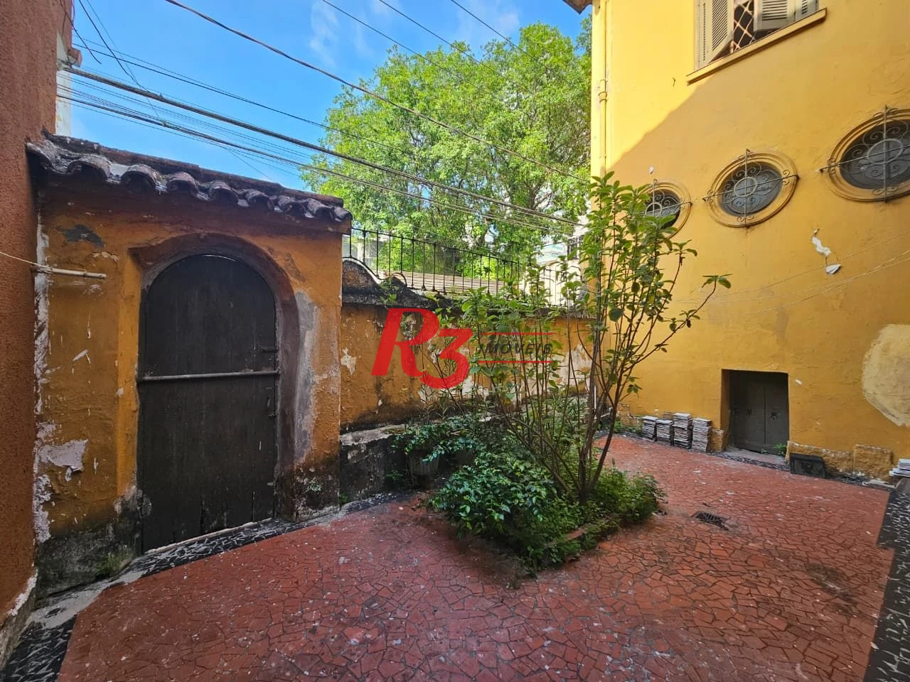 Sobrado com 3 dormitórios à venda, 150 m² por R$ 1.300.000,00 - Pompéia - Santos/SP