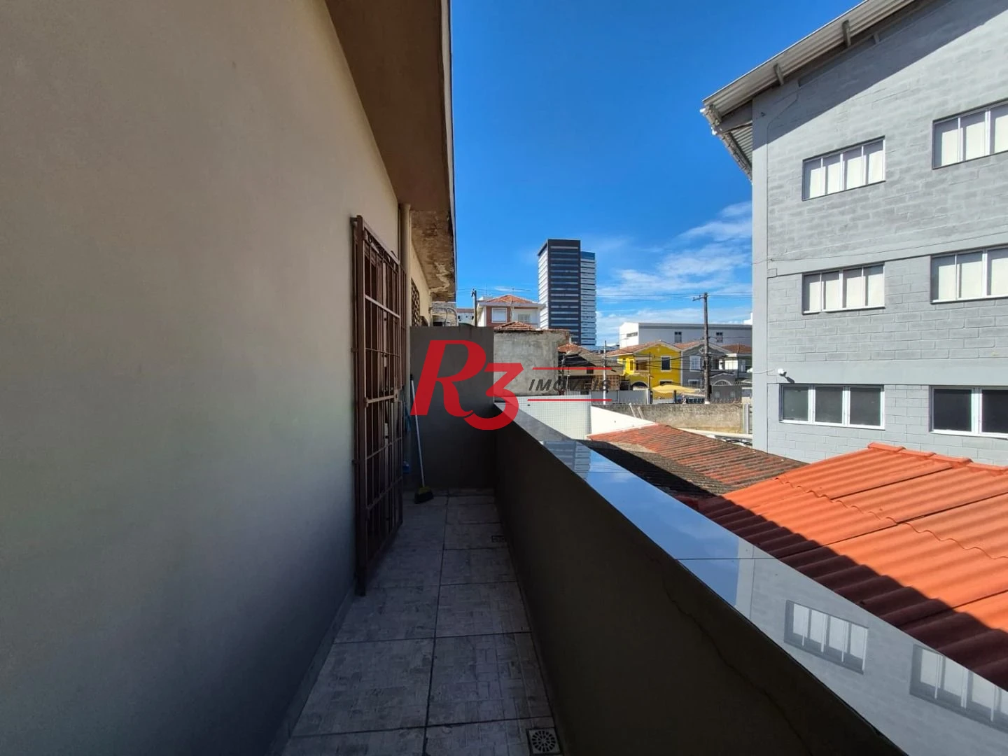 Sobrado com 3 dormitórios à venda, 140 m² por R$ 950.000,00 - Vila Matias - Santos/SP