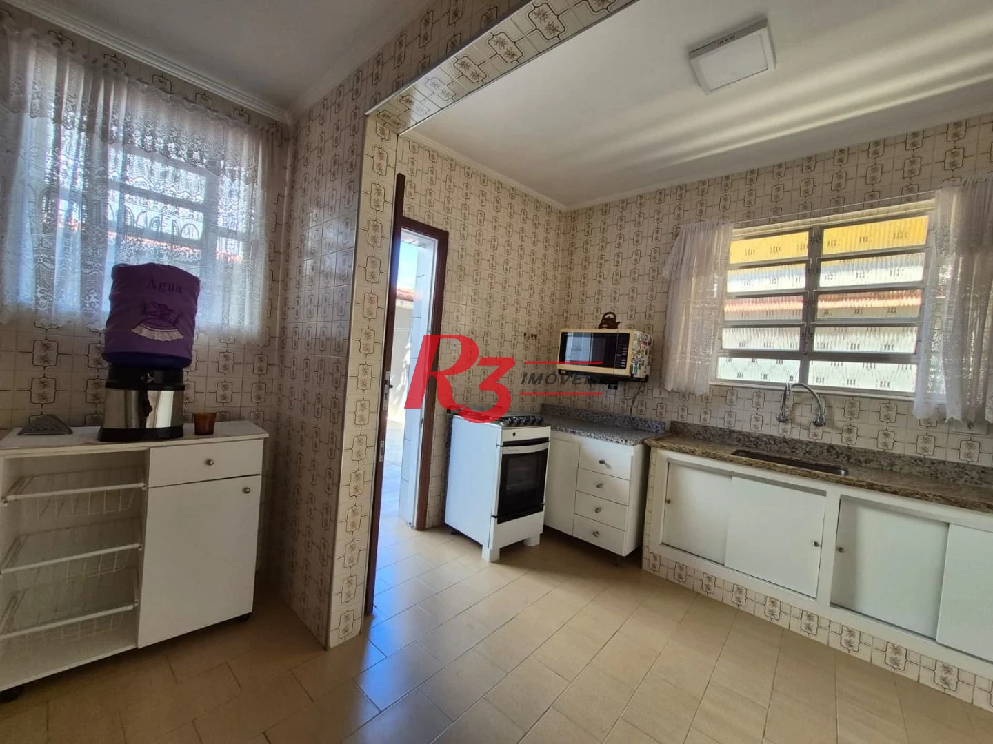 Sobrado com 3 dormitórios à venda, 140 m² por R$ 950.000,00 - Vila Matias - Santos/SP