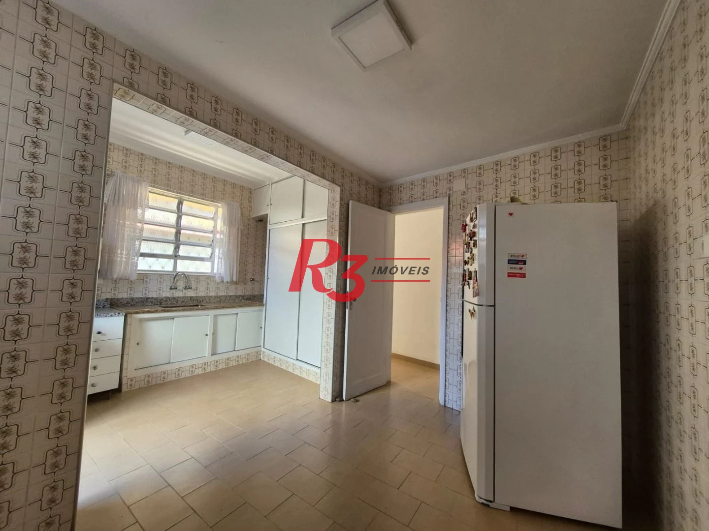 Sobrado com 3 dormitórios à venda, 140 m² por R$ 950.000,00 - Vila Matias - Santos/SP