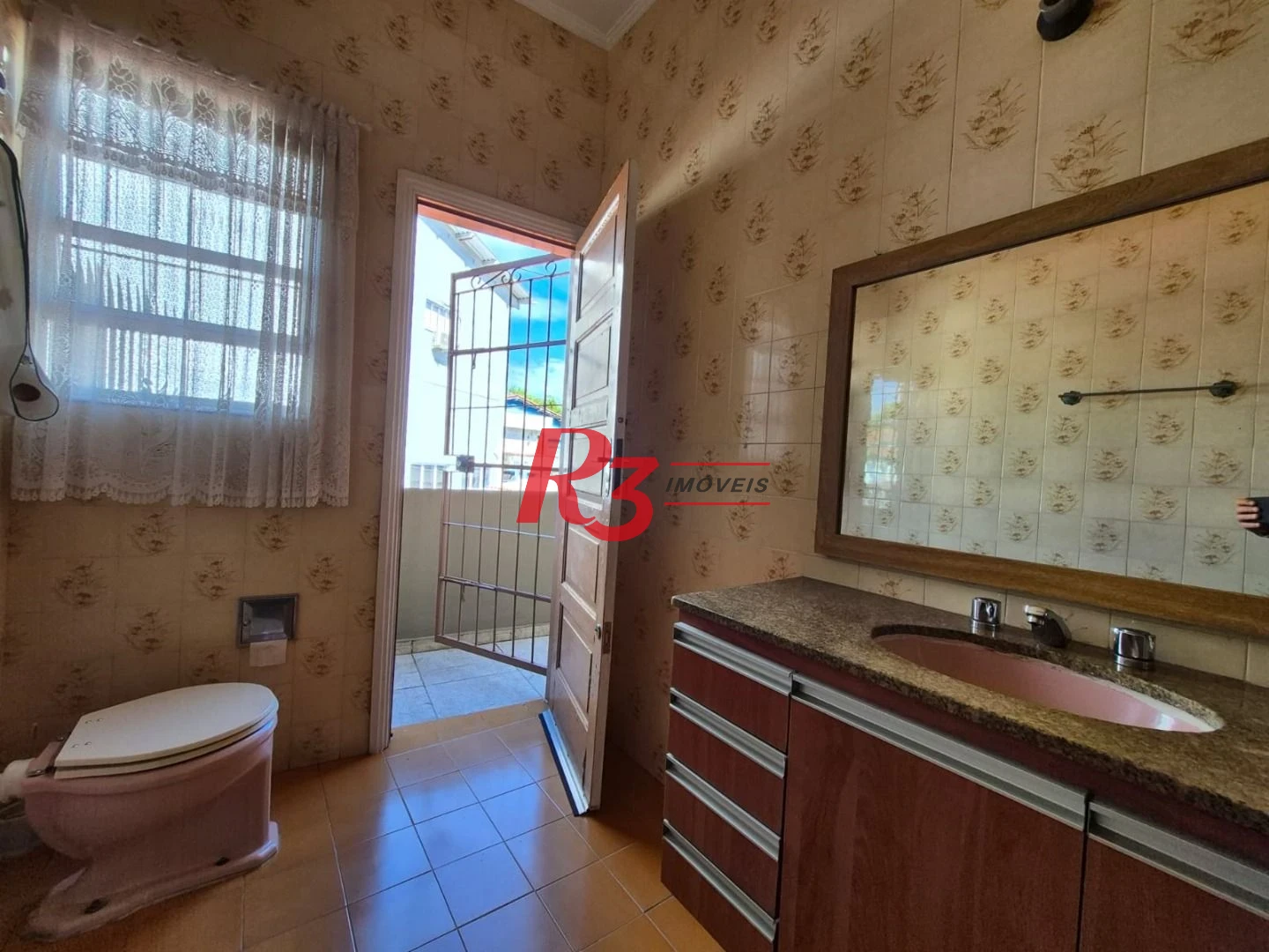 Sobrado com 3 dormitórios à venda, 140 m² por R$ 950.000,00 - Vila Matias - Santos/SP