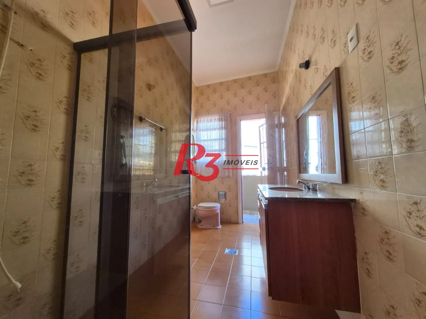 Sobrado com 3 dormitórios à venda, 140 m² por R$ 950.000,00 - Vila Matias - Santos/SP