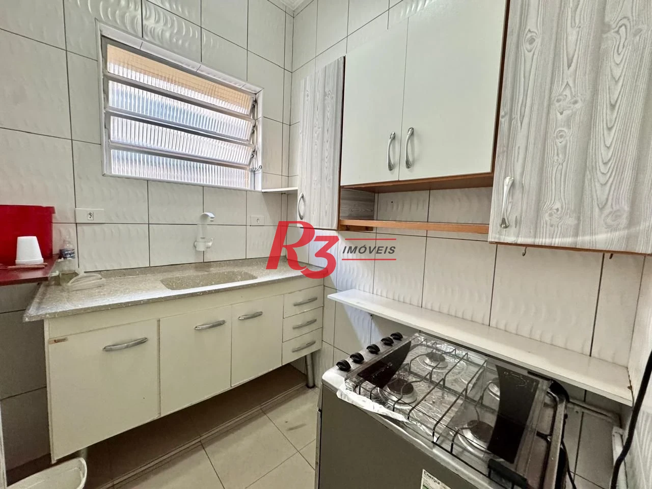 Apartamento com 1 dormitório para alugar, 55 m² por R$ 3.000,00/mês - Boqueirão - Santos/SP