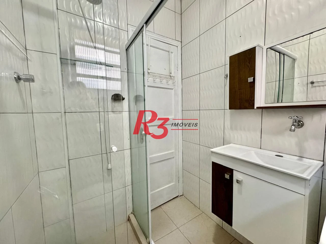 Apartamento com 1 dormitório para alugar, 55 m² por R$ 3.000,00/mês - Boqueirão - Santos/SP