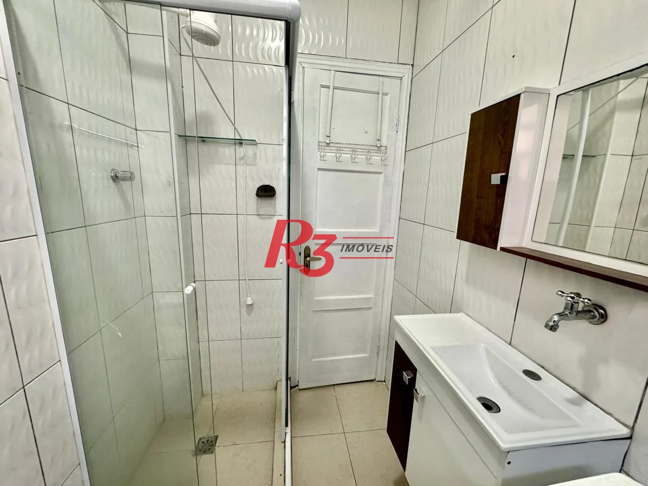 Apartamento com 1 dormitório para alugar, 55 m² por R$ 3.000,00/mês - Boqueirão - Santos/SP