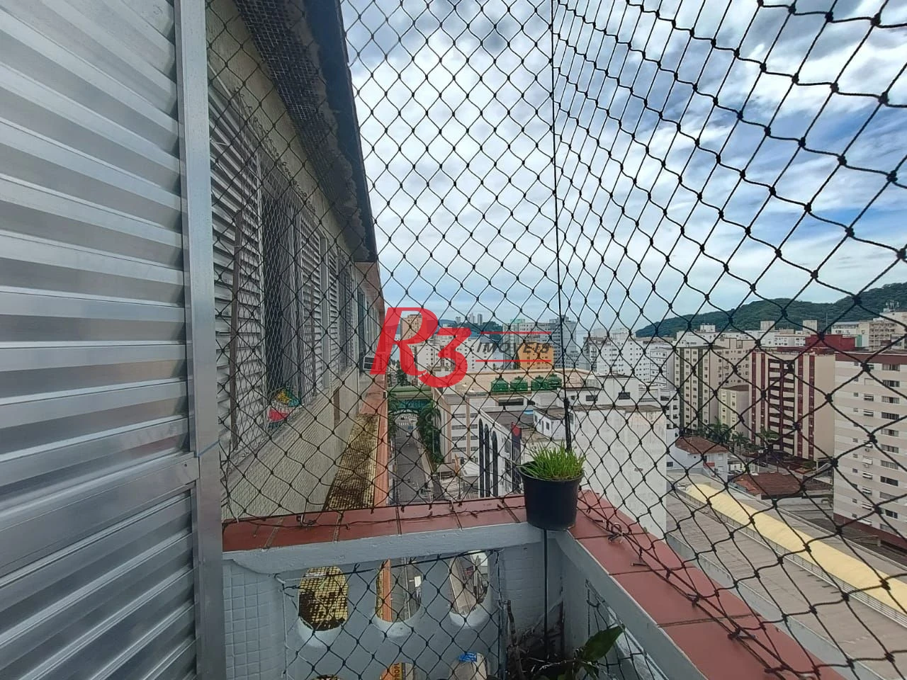 Apartamento com 3 dormitórios à venda, 110 m² por R$ 400.000,00 - Centro - São Vicente/SP
