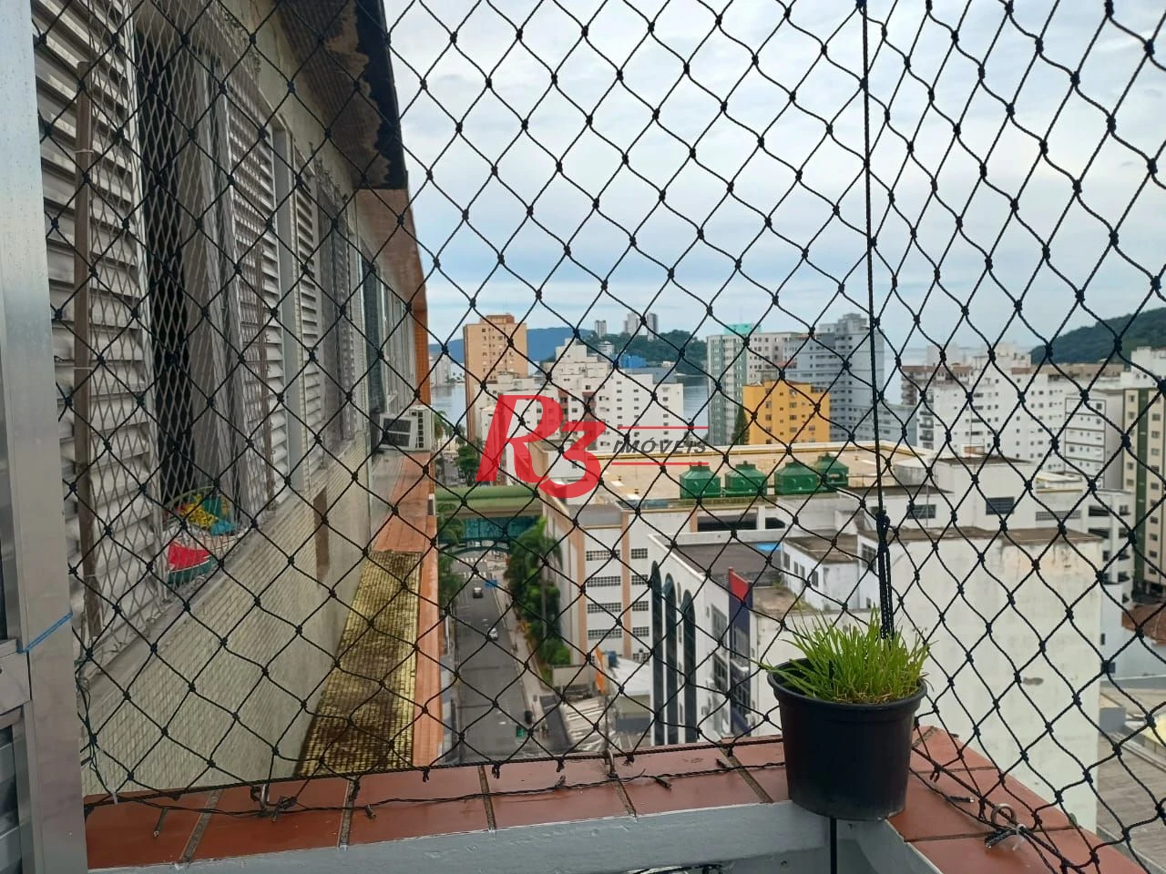 Apartamento com 3 dormitórios à venda, 110 m² por R$ 400.000,00 - Centro - São Vicente/SP
