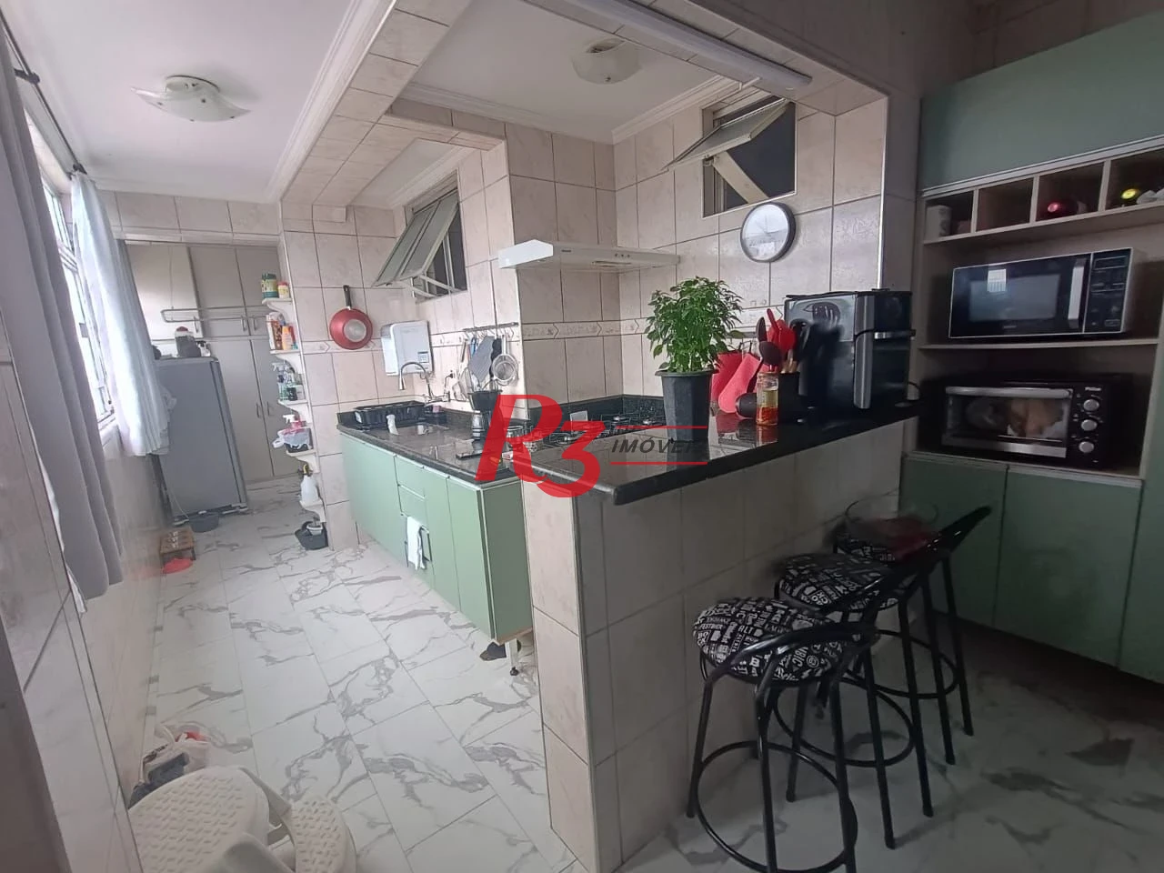 Apartamento com 3 dormitórios à venda, 110 m² por R$ 400.000,00 - Centro - São Vicente/SP