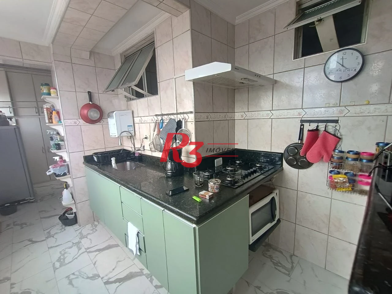 Apartamento com 3 dormitórios à venda, 110 m² por R$ 400.000,00 - Centro - São Vicente/SP