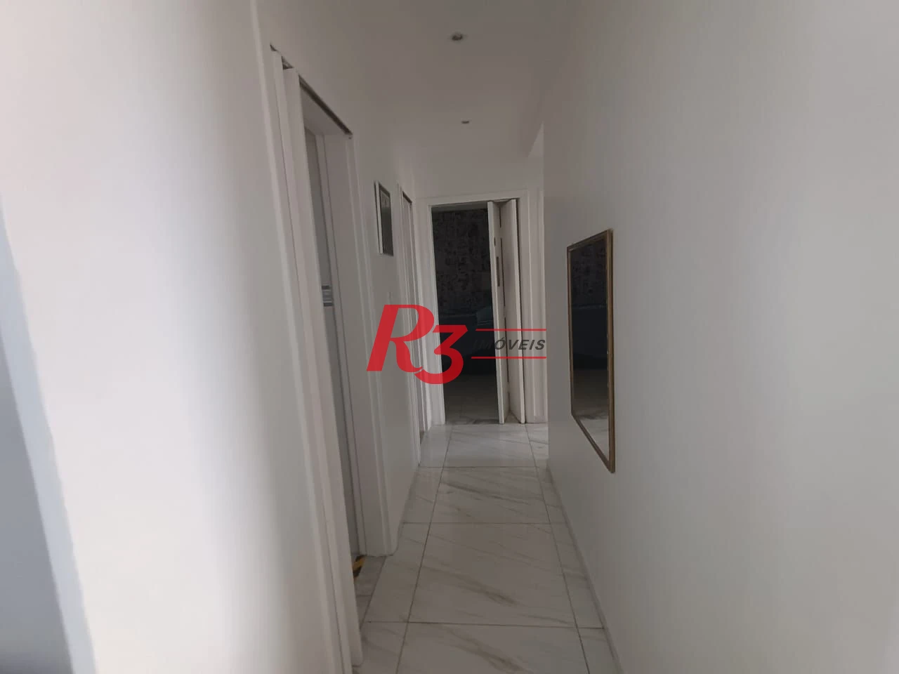 Apartamento com 3 dormitórios à venda, 110 m² por R$ 400.000,00 - Centro - São Vicente/SP