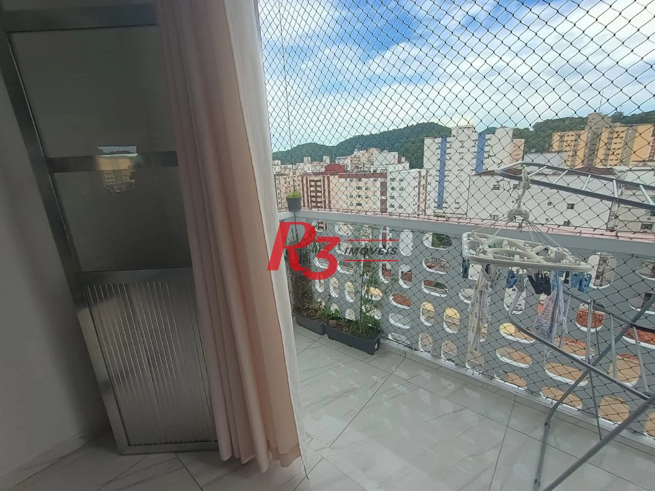 Apartamento com 3 dormitórios à venda, 110 m² por R$ 400.000,00 - Centro - São Vicente/SP