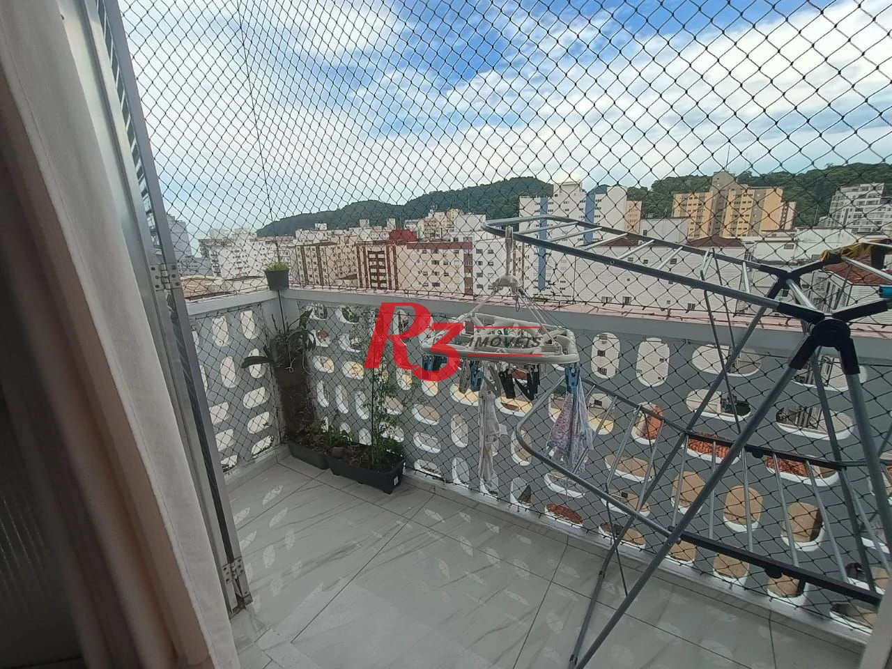 Apartamento com 3 dormitórios à venda, 110 m² por R$ 400.000,00 - Centro - São Vicente/SP