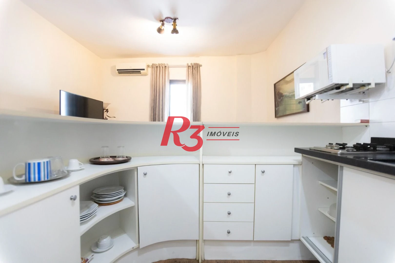 Flat com 1 dormitório à venda, 50 m² por R$ 300.000,00 - Gonzaga - Santos/SP