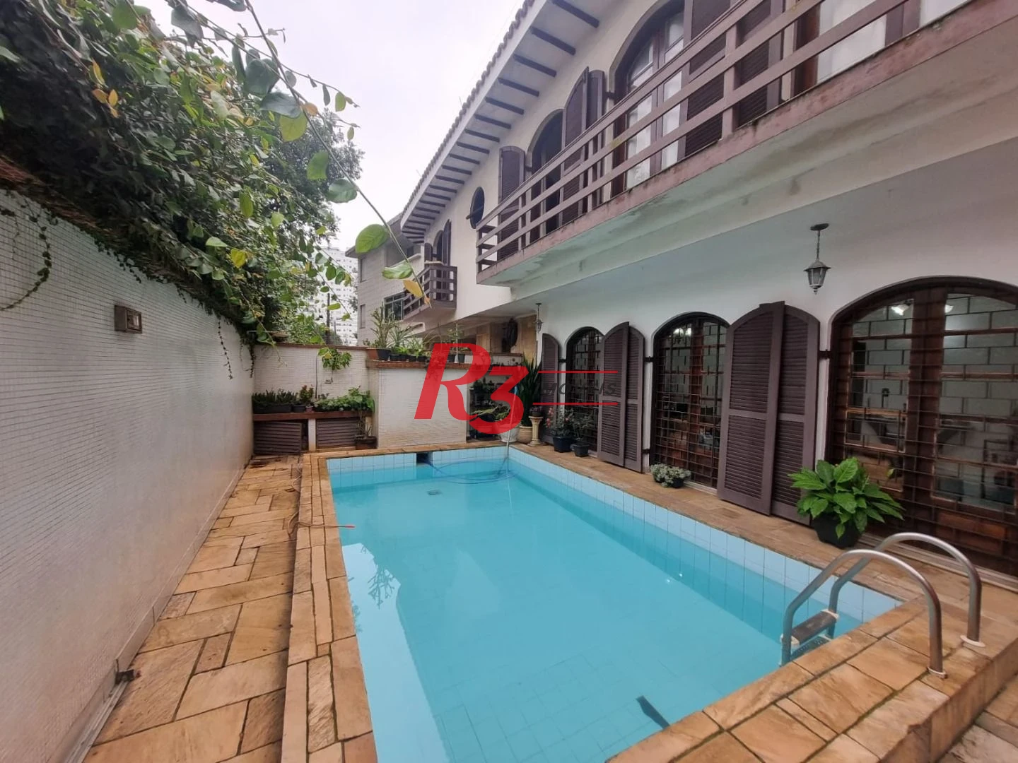 Casa com 3 dormitórios à venda, 150 m² por R$ 1.350.000,00 - Ponta da Praia - Santos/SP