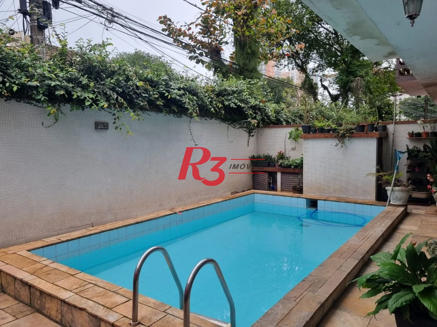 Casa com 3 dormitórios à venda, 150 m² por R$ 1.350.000,00 - Ponta da Praia - Santos/SP