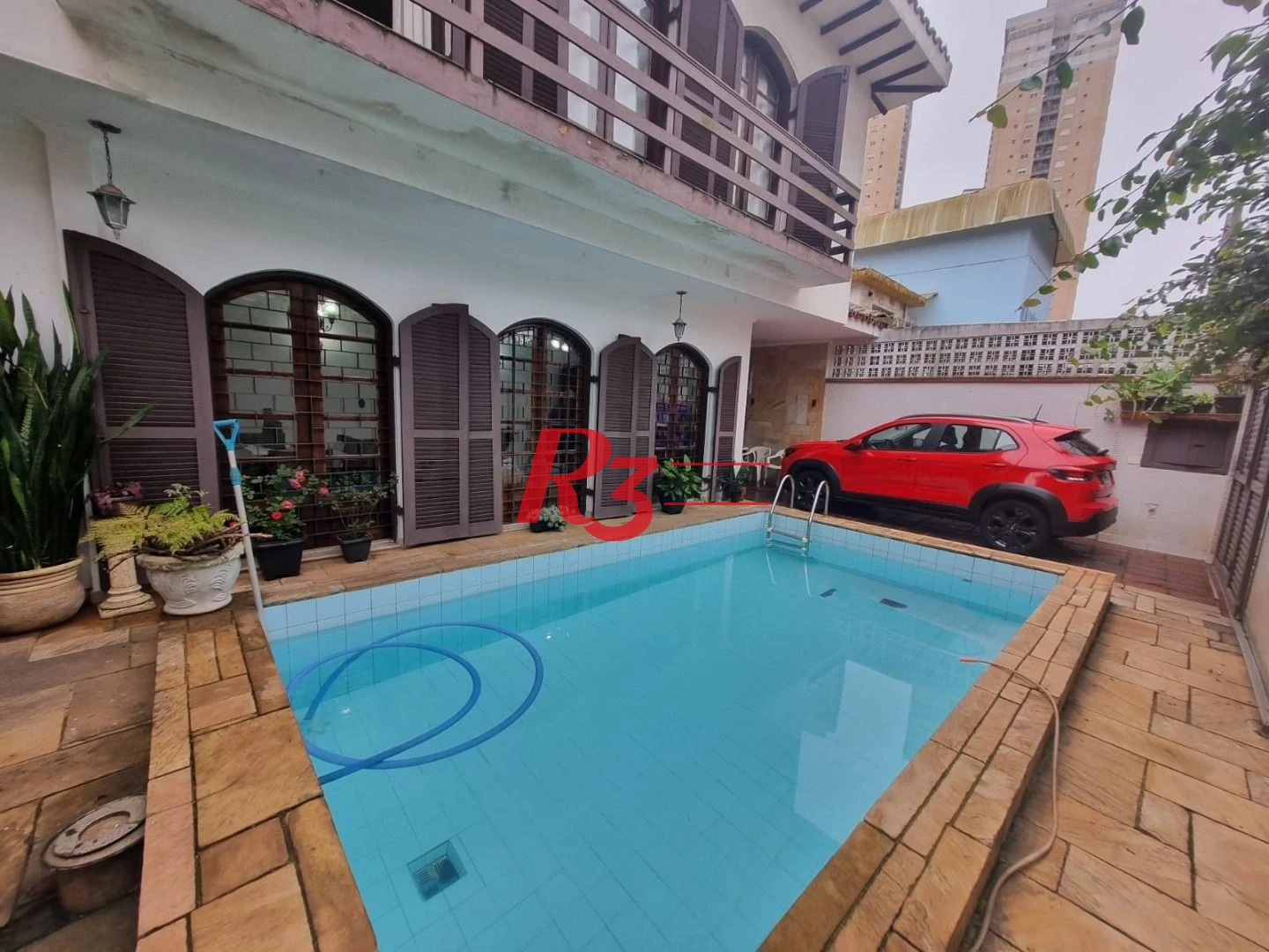 Casa com 3 dormitórios à venda, 150 m² por R$ 1.350.000,00 - Ponta da Praia - Santos/SP