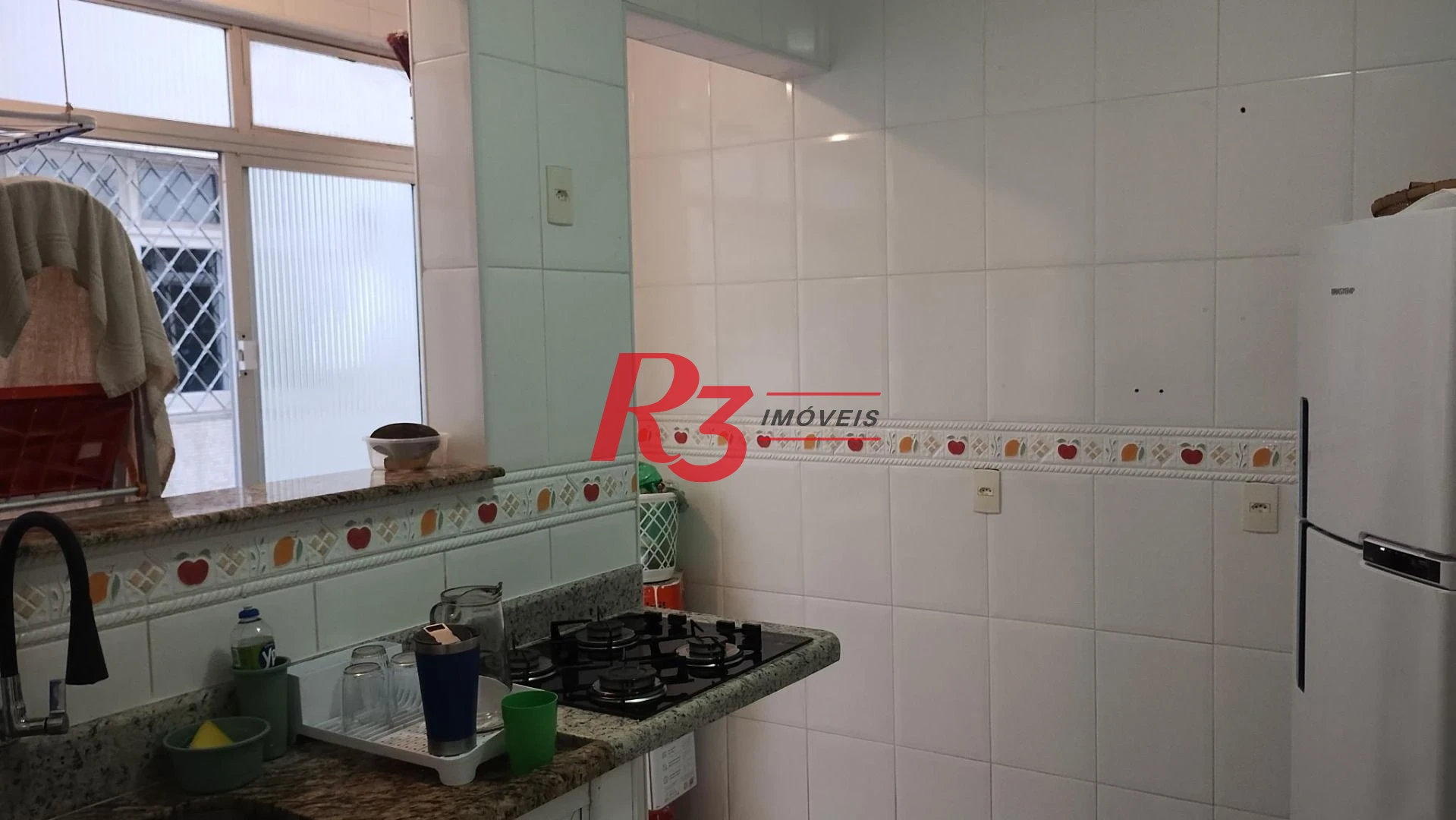 Apartamento com 2 dormitórios à venda, 68 m² por R$ 400.000,00 - Gonzaga - Santos/SP
