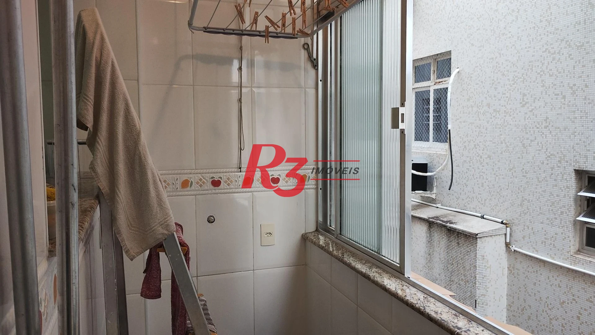 Apartamento com 2 dormitórios à venda, 68 m² por R$ 400.000,00 - Gonzaga - Santos/SP