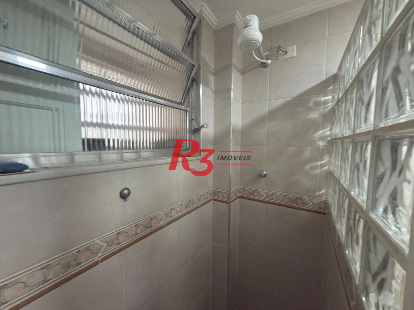 Apartamento com 1 dormitório para alugar, 69 m² por R$ 3.500,00/mês - Gonzaga - Santos/SP