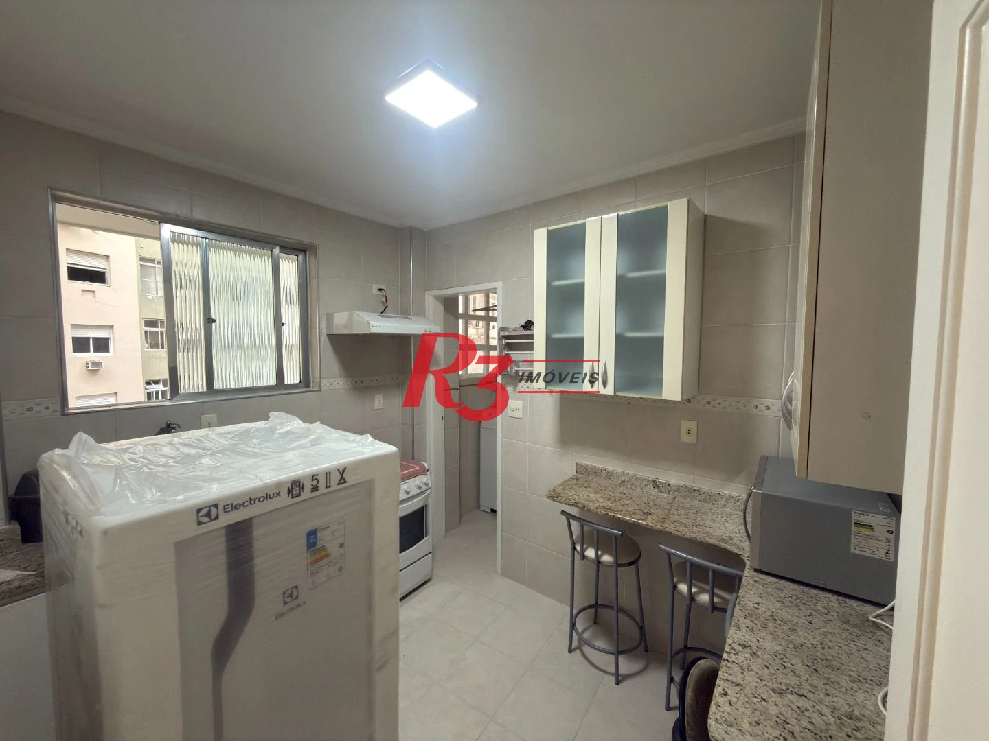 Apartamento com 1 dormitório para alugar, 69 m² por R$ 3.500,00/mês - Gonzaga - Santos/SP