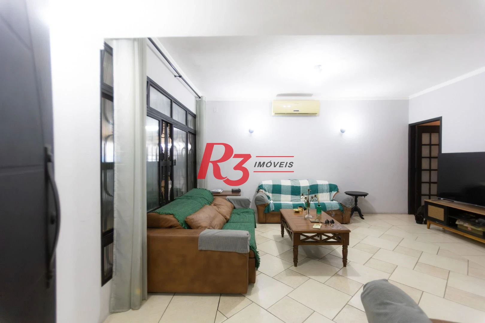 Casa à venda, 185 m² por R$ 1.100.000,00 - Ponta da Praia - Santos/SP