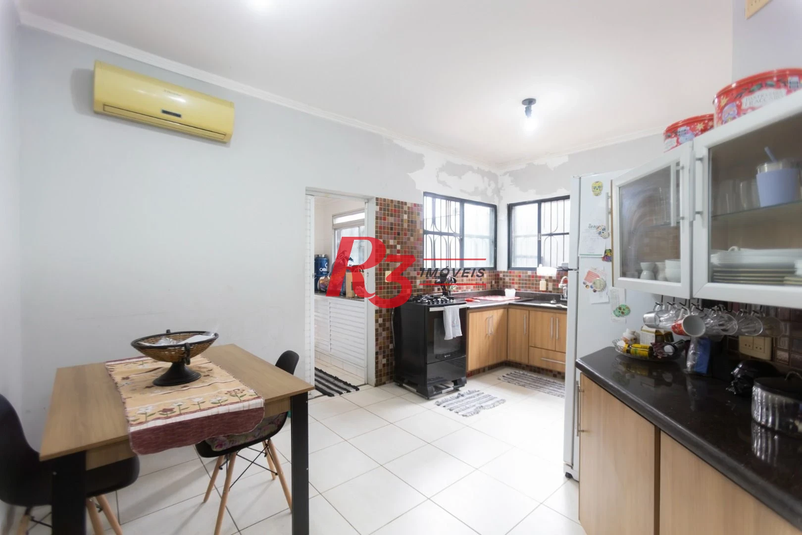 Casa à venda, 185 m² por R$ 1.100.000,00 - Ponta da Praia - Santos/SP