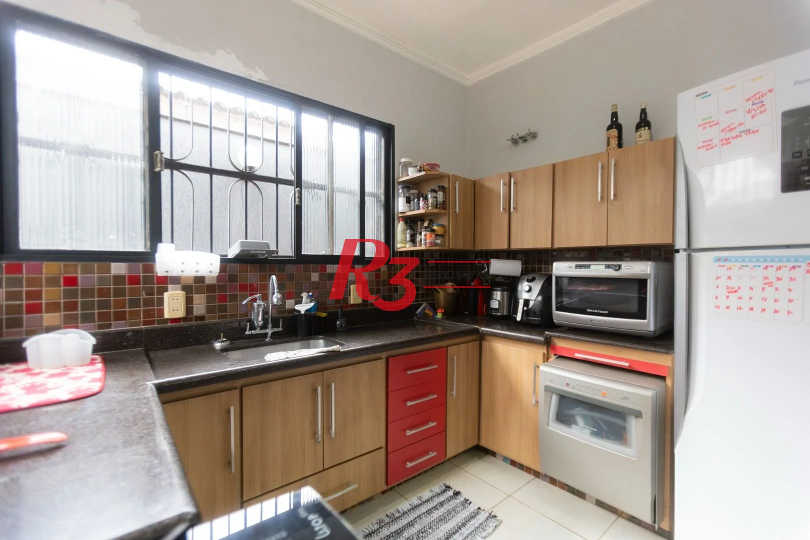 Casa à venda, 185 m² por R$ 1.100.000,00 - Ponta da Praia - Santos/SP