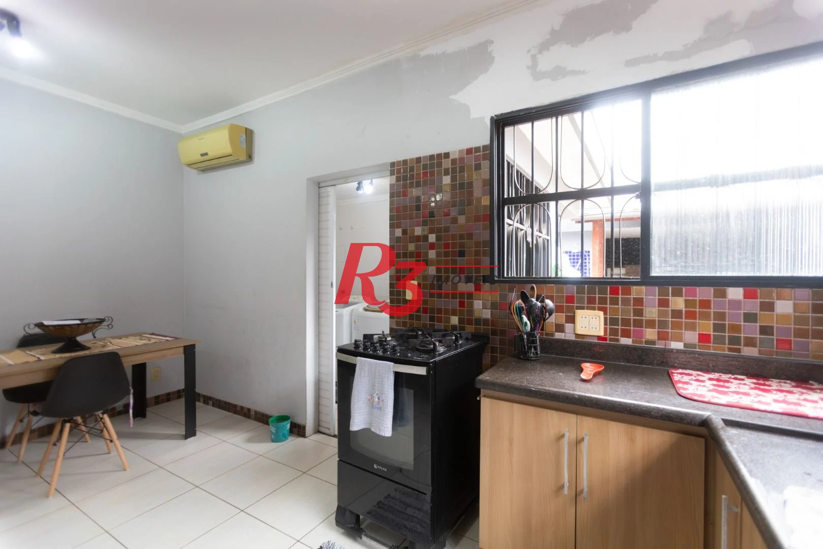 Casa à venda, 185 m² por R$ 1.100.000,00 - Ponta da Praia - Santos/SP