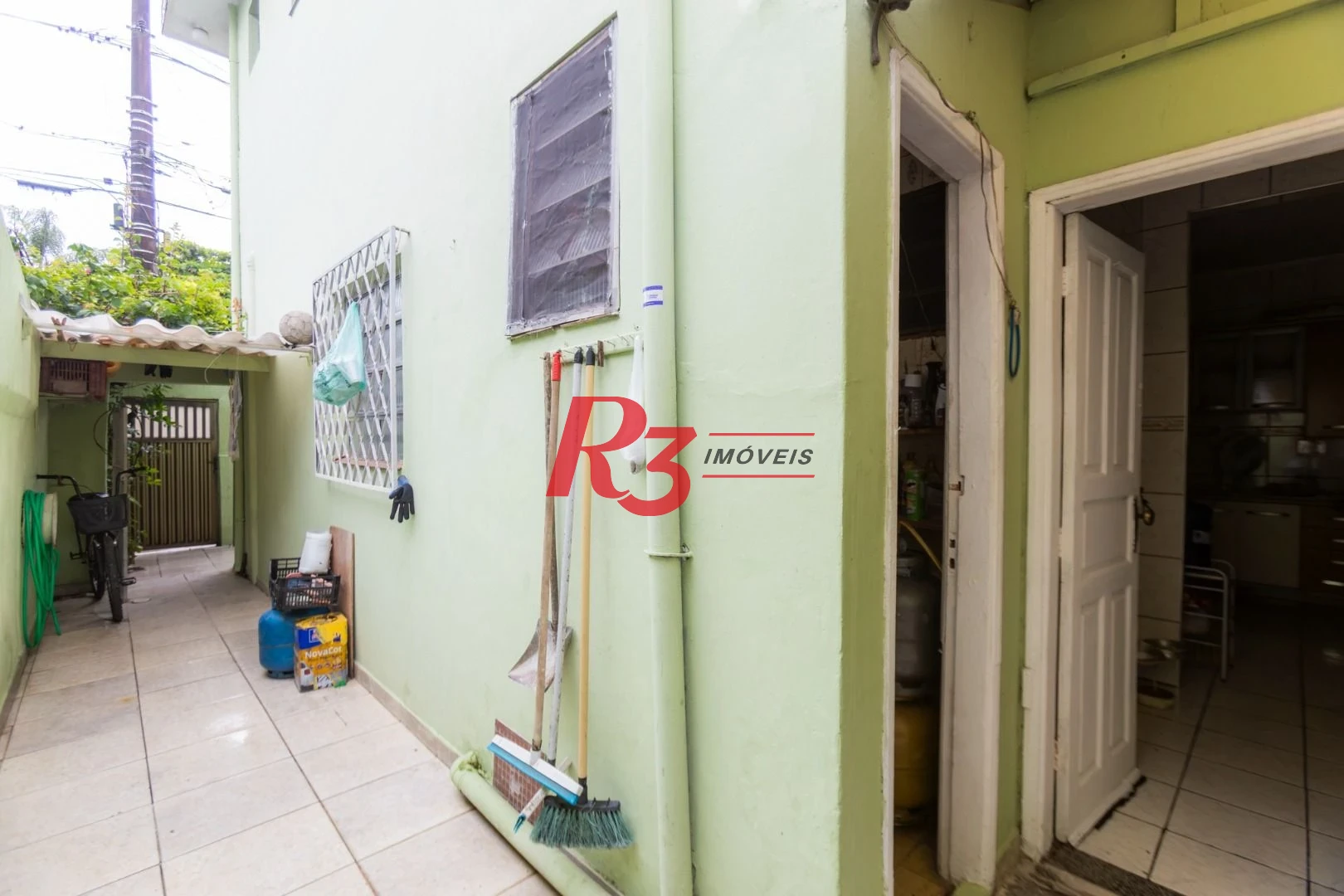 Sobrado à venda, 117 m² por R$ 470.000,00 - Estuário - Santos/SP