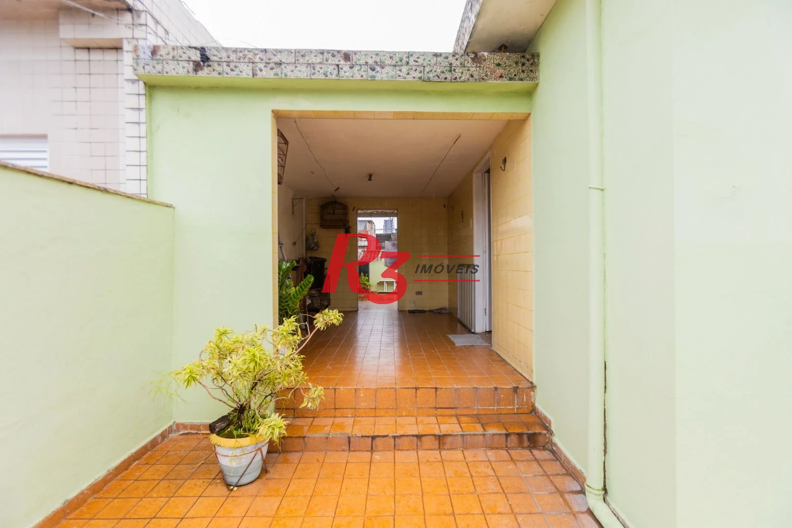 Sobrado à venda, 117 m² por R$ 470.000,00 - Estuário - Santos/SP
