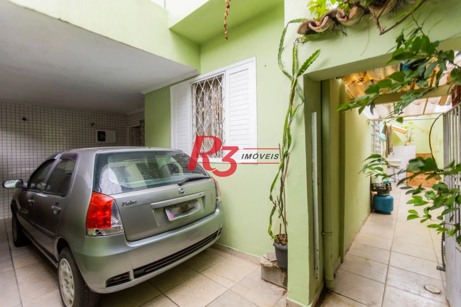 Sobrado à venda, 117 m² por R$ 470.000,00 - Estuário - Santos/SP
