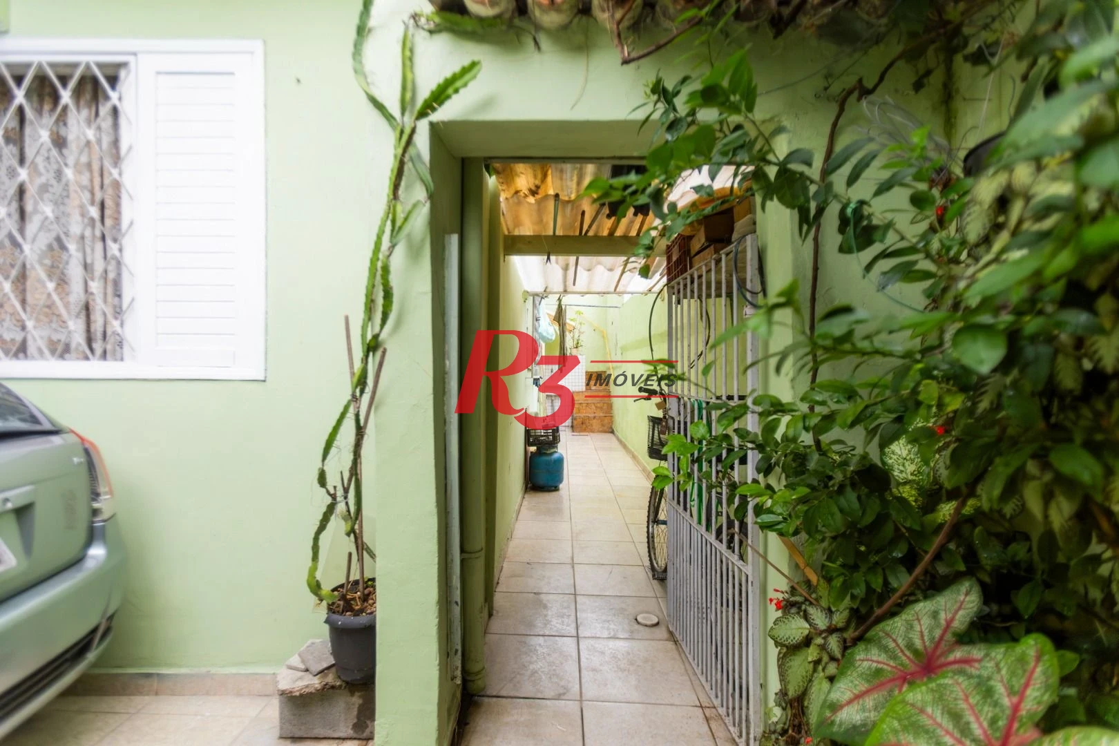 Sobrado à venda, 117 m² por R$ 470.000,00 - Estuário - Santos/SP