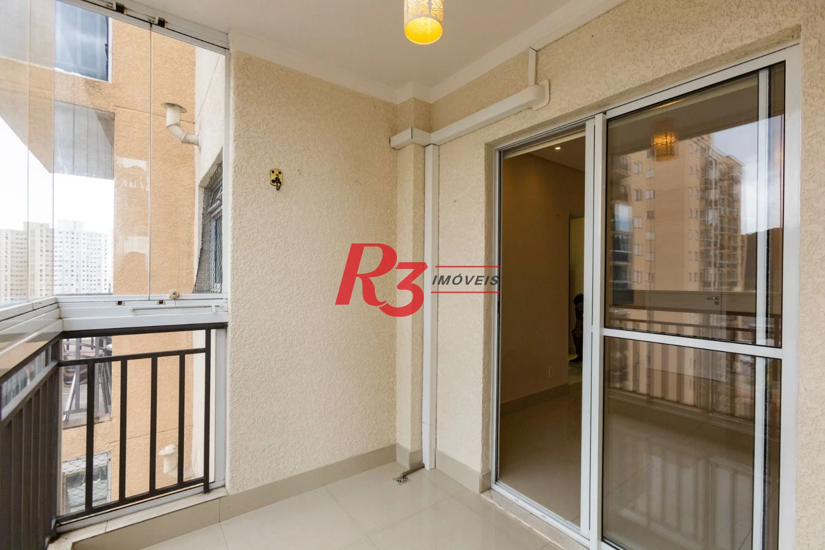 Apartamento com 2 dormitórios à venda, 62 m² por R$ 430.000,00 - Areia Branca - Santos/SP