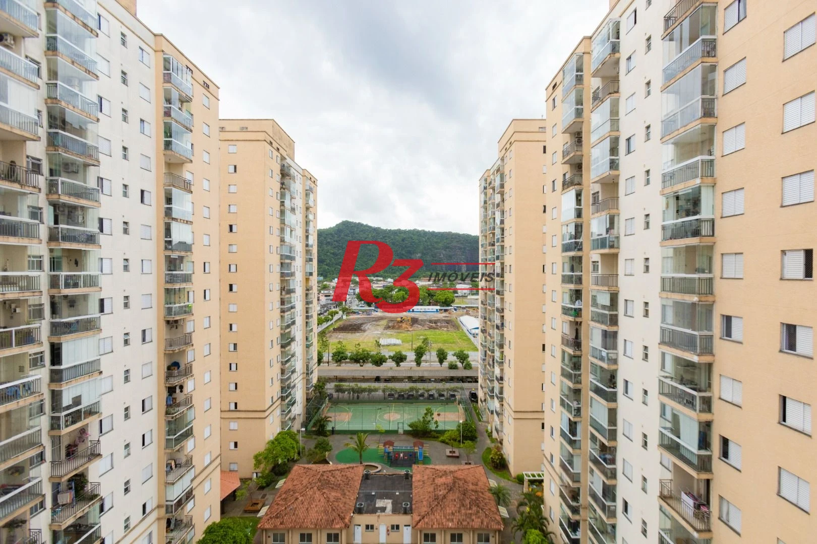 Apartamento com 2 dormitórios à venda, 62 m² por R$ 430.000,00 - Areia Branca - Santos/SP